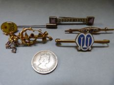 2 x gold coloured brooches and one other etc.