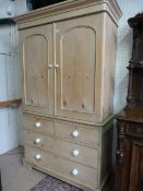 An antique pine linen press