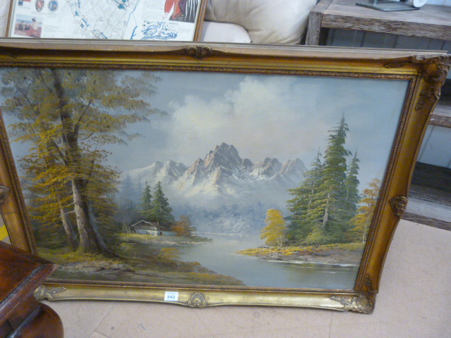 A signed oil painting of a Lake scene