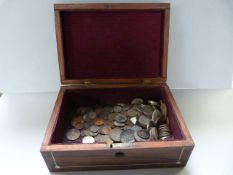 An inlaid jewellery box with various coins