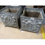 A pair of square lead planters signed "Hills" depicting various flowers etc.