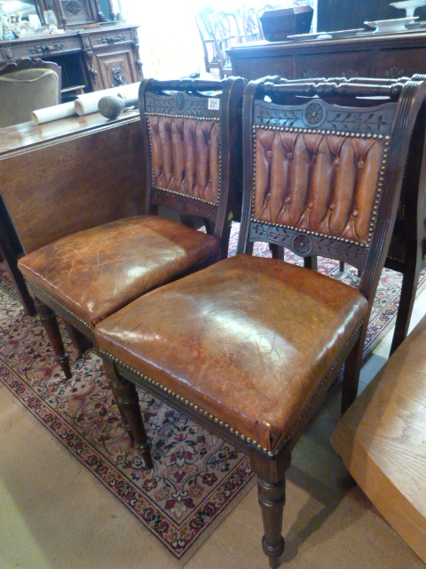 A Set of four leather upholstered dining chairs - Image 2 of 2