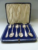 A cased set of hallmarked silver coffee spoons