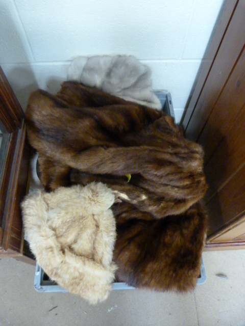 A quantity of fur and faux coats, stoles and hats