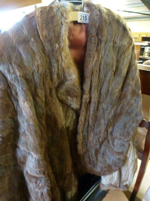 A fur coat and stole ( size 18) by Edelson