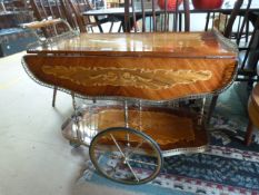A highly decorative tea trolley with inlay