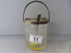 A glass Hallmarked silver topped sugar pot with handle - London 1936