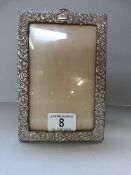 A hallmarked silver photo frame