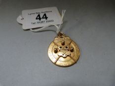 A 9 ct gold medallion- weight 13.4g