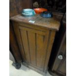 An oak pot cupboard