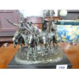 After Frederic Remington a bronze "Coming through the rye", modelled as four cowboys with guns