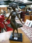 An Art Deco style bronze of a girl