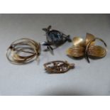 A 9ct Gold brooch, two others and a hallmaked silver brooch