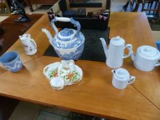 A collection of china to include Spode and Royal Worcester teapots
