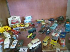 A quantity of vintage toy cars