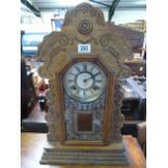 An Ansonia clock Co. American mantle clock- key and pendulum in office