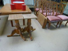 A large teak dining room table and 8 chairs