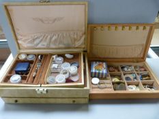 A quantity of various costume jewellery, badges etc in two boxes