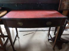 A Bow fronted desk with single drawer