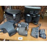 2 pairs of binoculars, camera and opera glasses