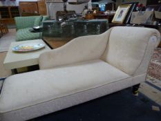 A small reproduction Chaise Lounge