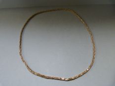 An 9ct Hallmarked gold chain - weight 28.9 g