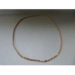 An 9ct Hallmarked gold chain - weight 28.9 g