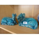 A pair of 19th century Chinese turquoise glazed recumbent rams- slight damage to one ear