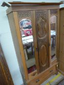 A Satinwood double wardrobe A/F