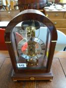 A contemporary mahogany and glass cased skeleton mantle clock by Sewills of Liverpool, maker to