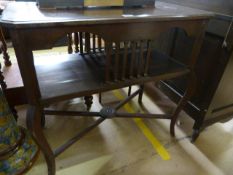 A stained beech centre table with cross stretchers