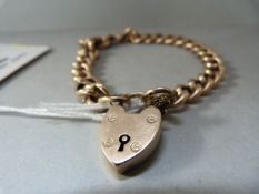 A 9ct rose gold bracelet with padlock- weight 13.1g