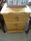 A Pine bedside chest of drawers