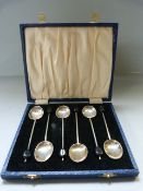 A cased set of hallmarked silver coffee bean spoons