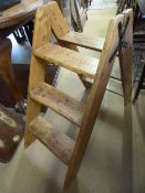 A pair of pine folding steps