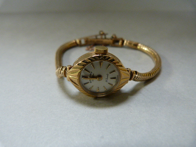 A ladies 9ct gold Rotary wristwatch with 9ct gold strap