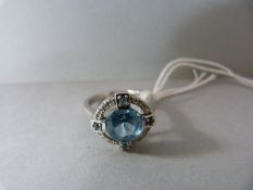 A Topaz and Diamond 10ct white gold ring