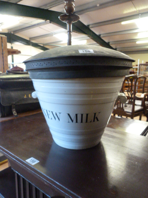 A Vintage milk pale with copper lid