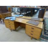 A teak mid century dressing table