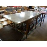 A Retro veneered kitchen table and two extra leaves