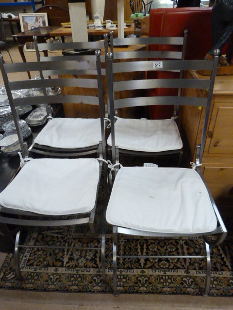 A Set of four Heals of London metal chairs