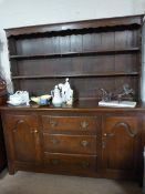 An oak dresser with two cupboards