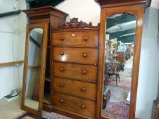 A Victorian mahogany wardrobe with central drawer section