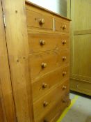 A pine chest of drawers