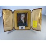 A miniature portrait of a gentleman in leather case