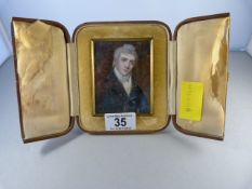 A miniature portrait of a gentleman in leather case