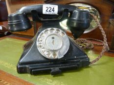 A vintage bakelite GPO telephone