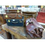 A collection of vintage luggage to inc a Gladstone bag and an Antler suit carrier