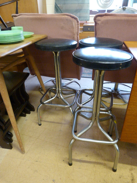 Three leather bar stools