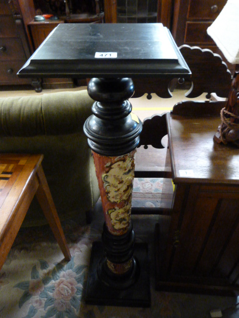 An ebonised and pottery plant stand